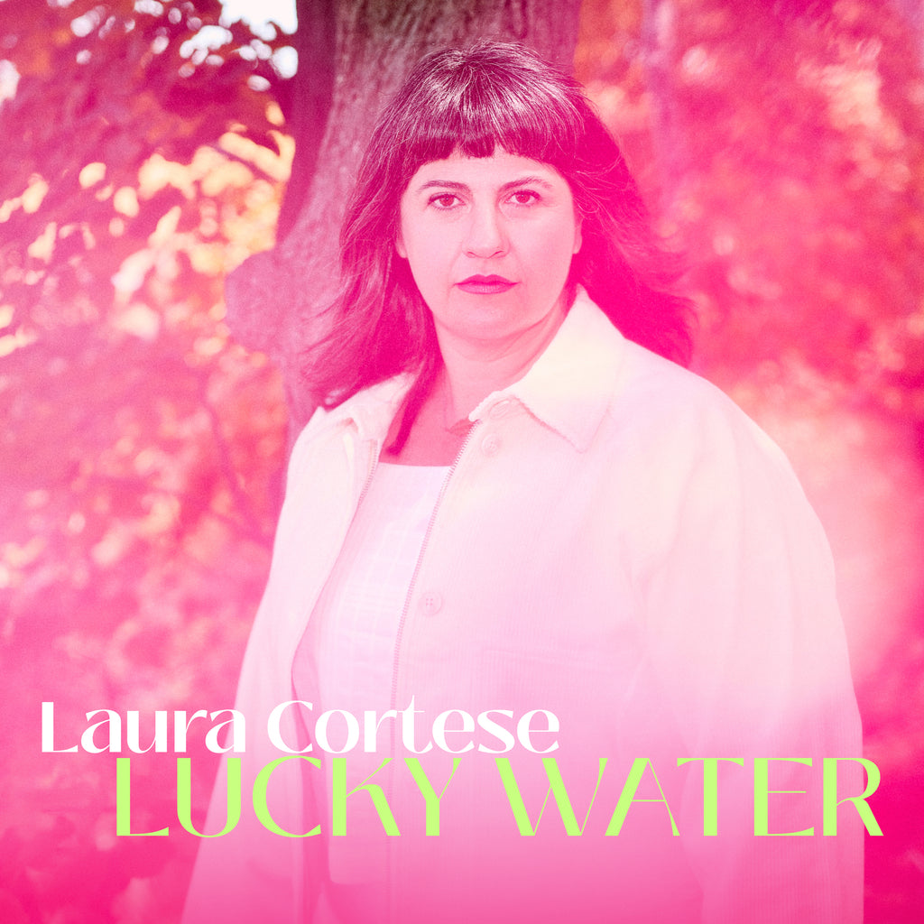 Laura Cortese Lucky Water album cover with a pink portrait and white and green title text